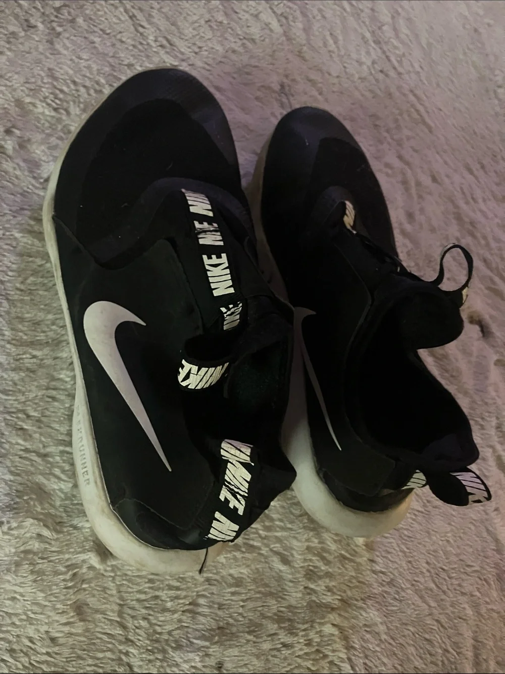 Nike Black Slip-On Athletic Shoes with White Swoosh Accent